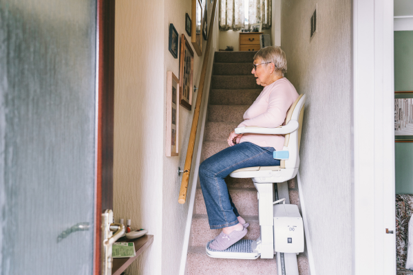 stairlift being used on stairs